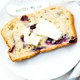 รูปภาพหน้าปกบทความ:Blueberry Yogurt Bread สูตรขนมปังนุ่มๆ อร่อยชุ่มฉ่ำรสบลูเบอร์รี่ เต็มรสโยเกิร์ต