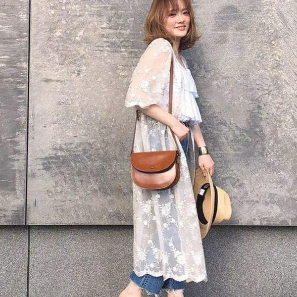 รูปภาพหน้าปกบทความ:แมทช์ลุคให้ดูเก๋! ด้วย ไอเดียแฟชั่น 'เสื้อคลุมตัวยาว' แต่งชิคๆ สไตล์สาวญี่ปุ่น