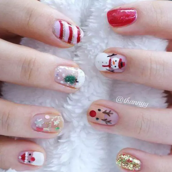 รูปภาพหน้าปกบทความ:Christmas Cute Nails! ส่องไอเดีย 'ทำเล็บรับเทศกาลคริสต์มาส' สุดน่ารัก ไม่ทำไม่ได้จ้า