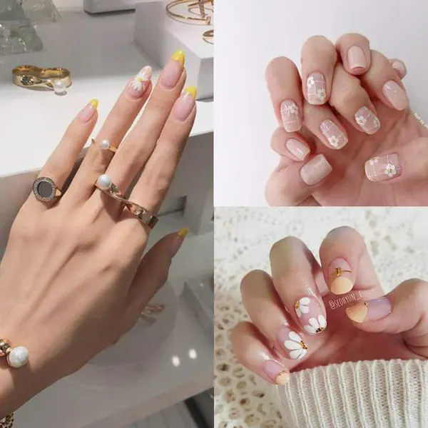 รูปภาพหน้าปกบทความ:เอาใจสายหวาน! รวมไอเดียทำเล็บลาย "ดอกเดซี่สีหวาน" สไตล์เรียบหรูดูแพง 🌸💖🌸